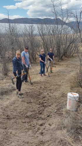 May be an image of 4 people and ocotillo